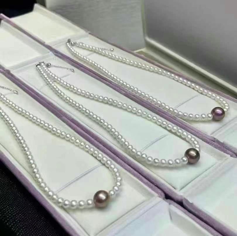 Baby Pearl Necklace Featuring a Purple Pearl | 3–4mm White Accent Pearls & 8–9mm Center Pearl | Sterling Silver Clasp